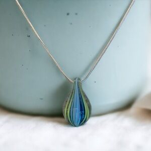 Italian blown glass piece on sterling silver chain. Vibrant colors.